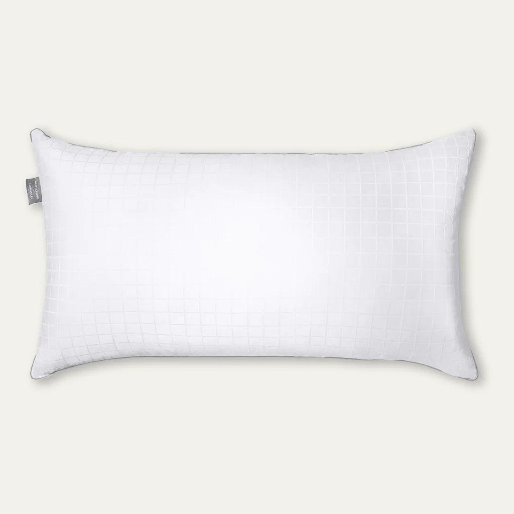 White pillow on a light beige background
